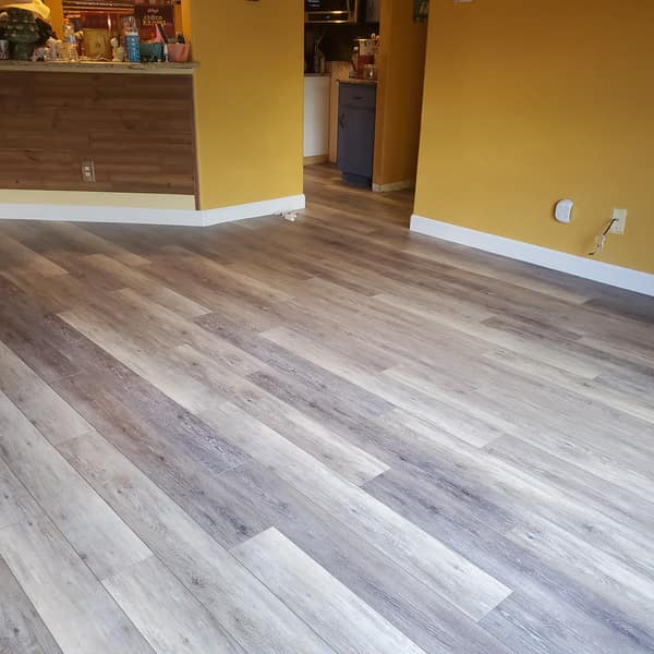 Luxury vinyl plank flooring in an open living area